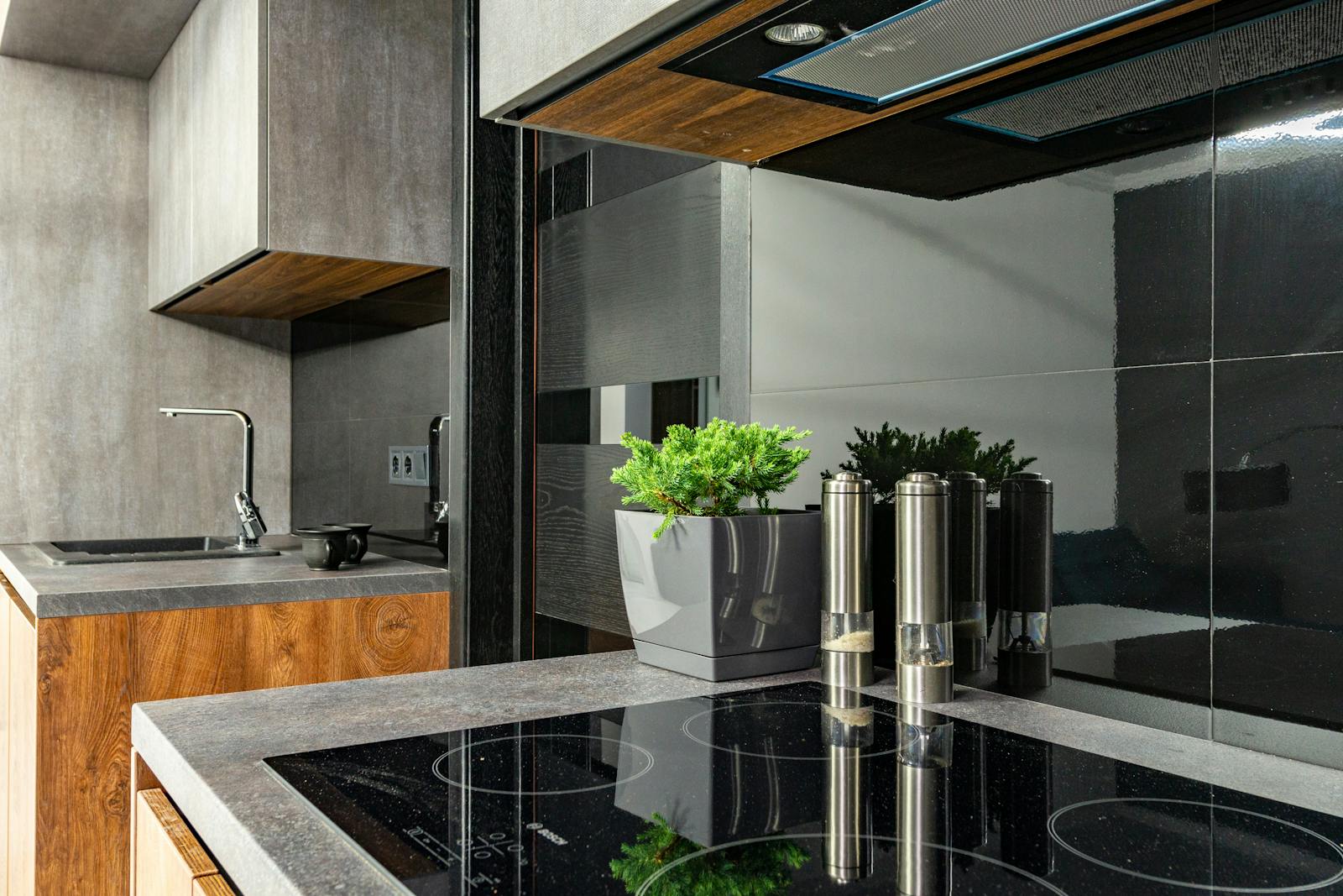 A modern kitchen seating area — banquette benches are built in and finished to match the surrounding cabinetry