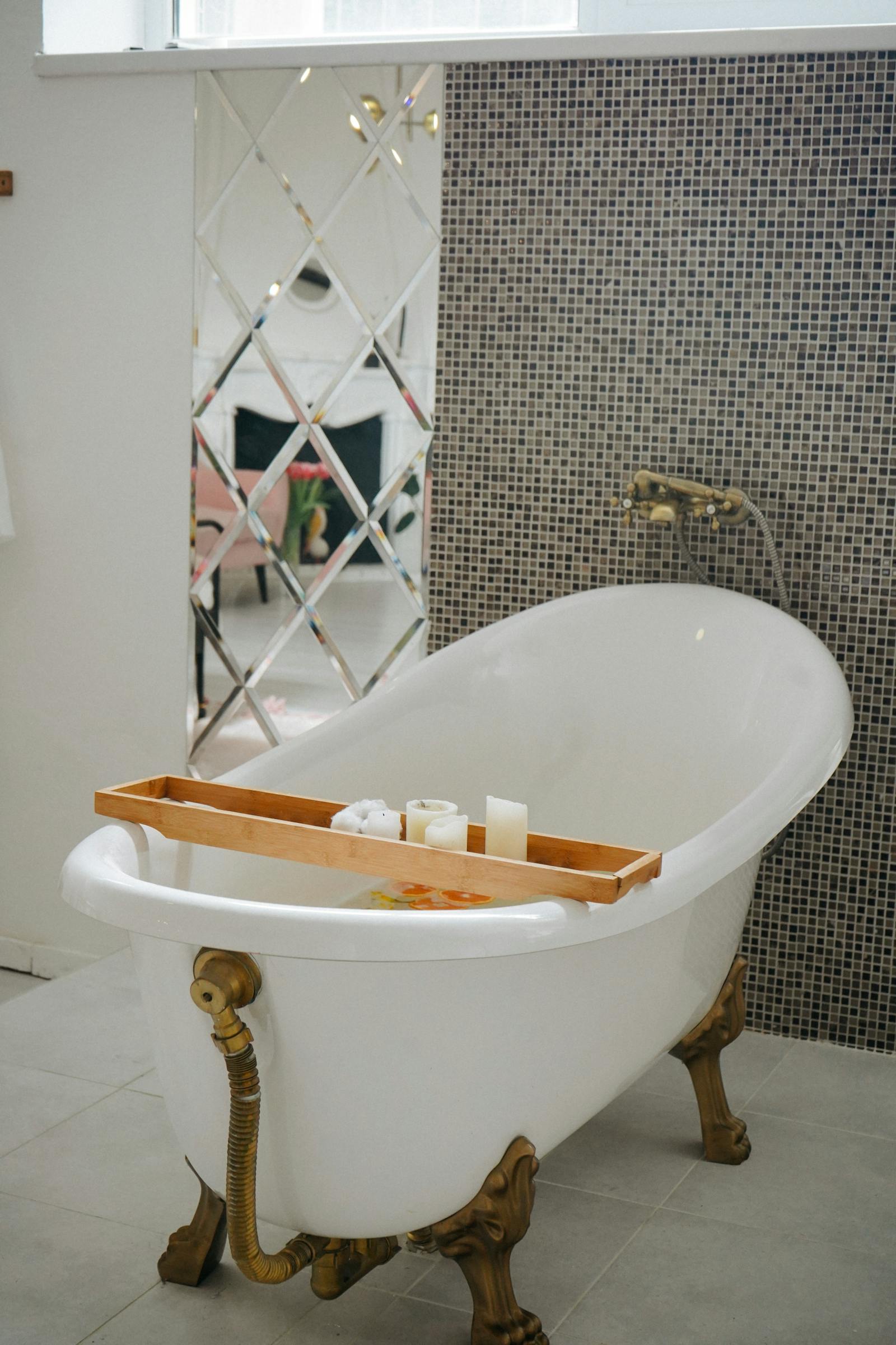 A freestanding soaking tub positioned by a window — the spa-style placement a freestanding tub allows