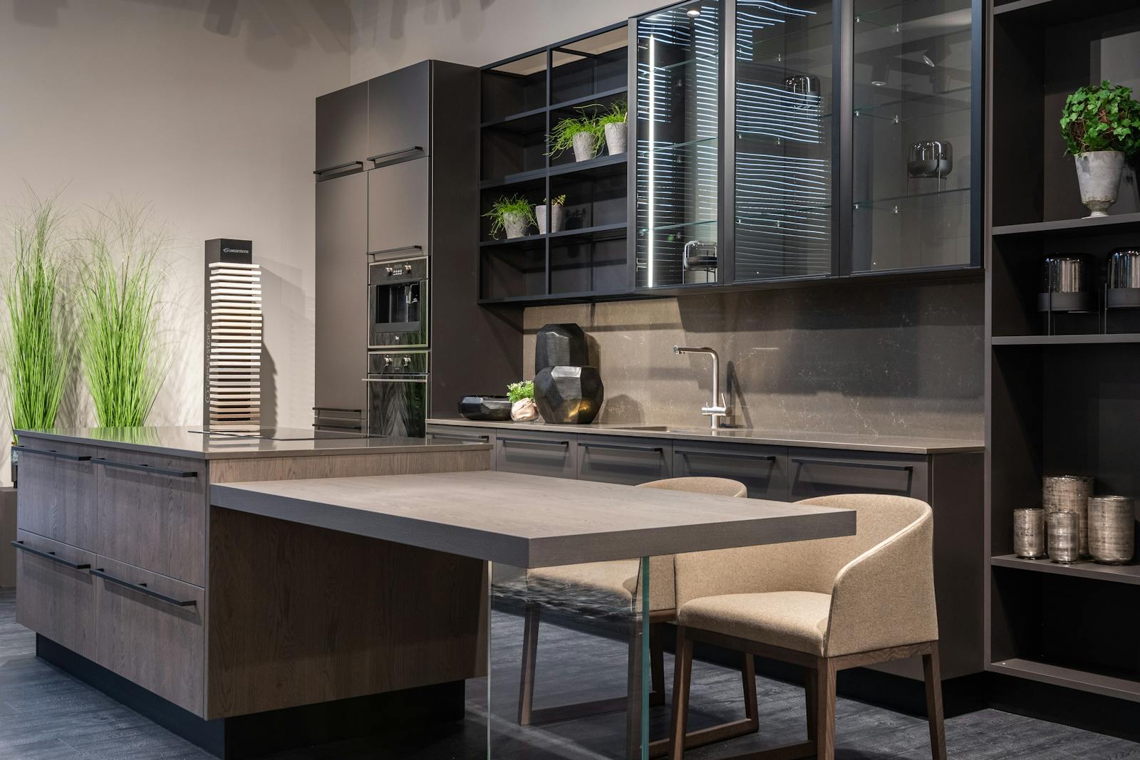 A modern kitchen with deep, charcoal-toned stone counters — the dark, matte look soapstone is known for