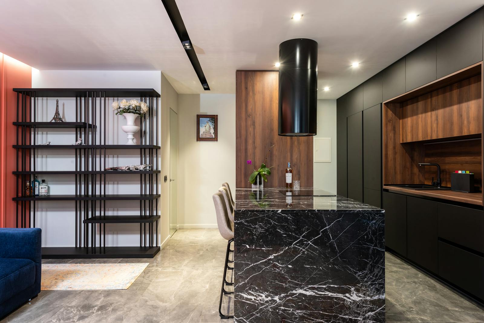 A close, detailed look at a dark natural-stone kitchen counter — soapstone's everyday care is as simple as soap and water
