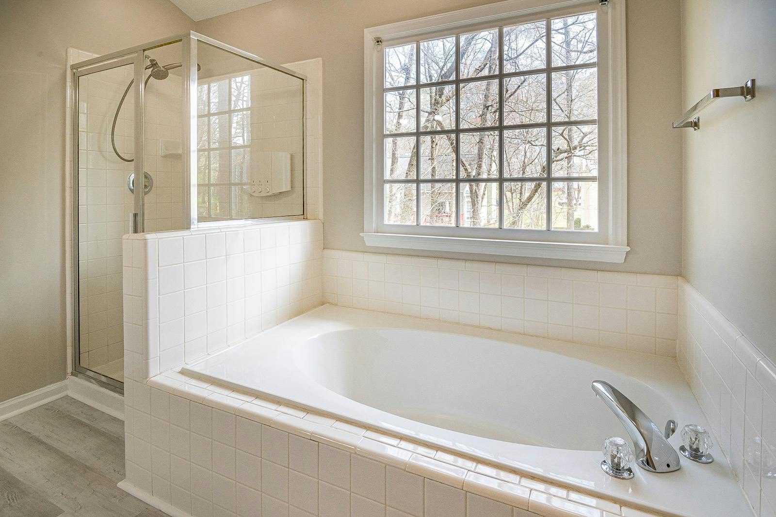 A bright, open wet-room-style bathroom — removing the shower enclosure keeps a small footprint feeling open