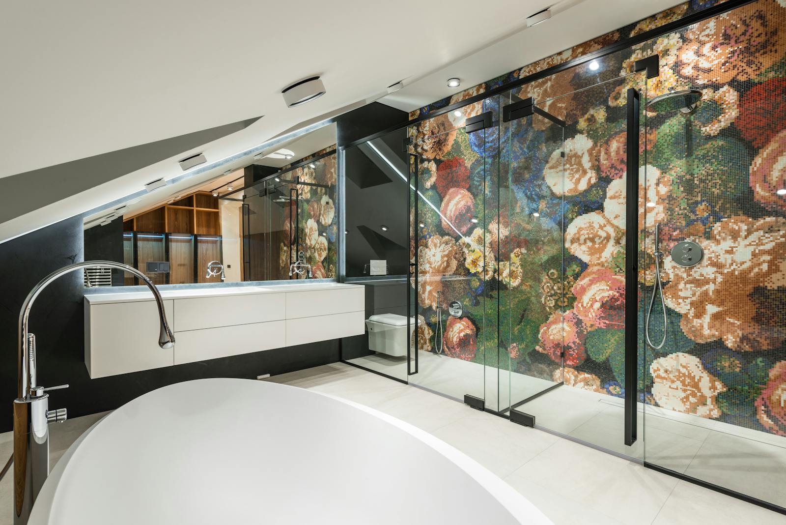 An open, fully tiled bathroom with a curbless shower area — the barrier-free, spa-like feel of a wet room